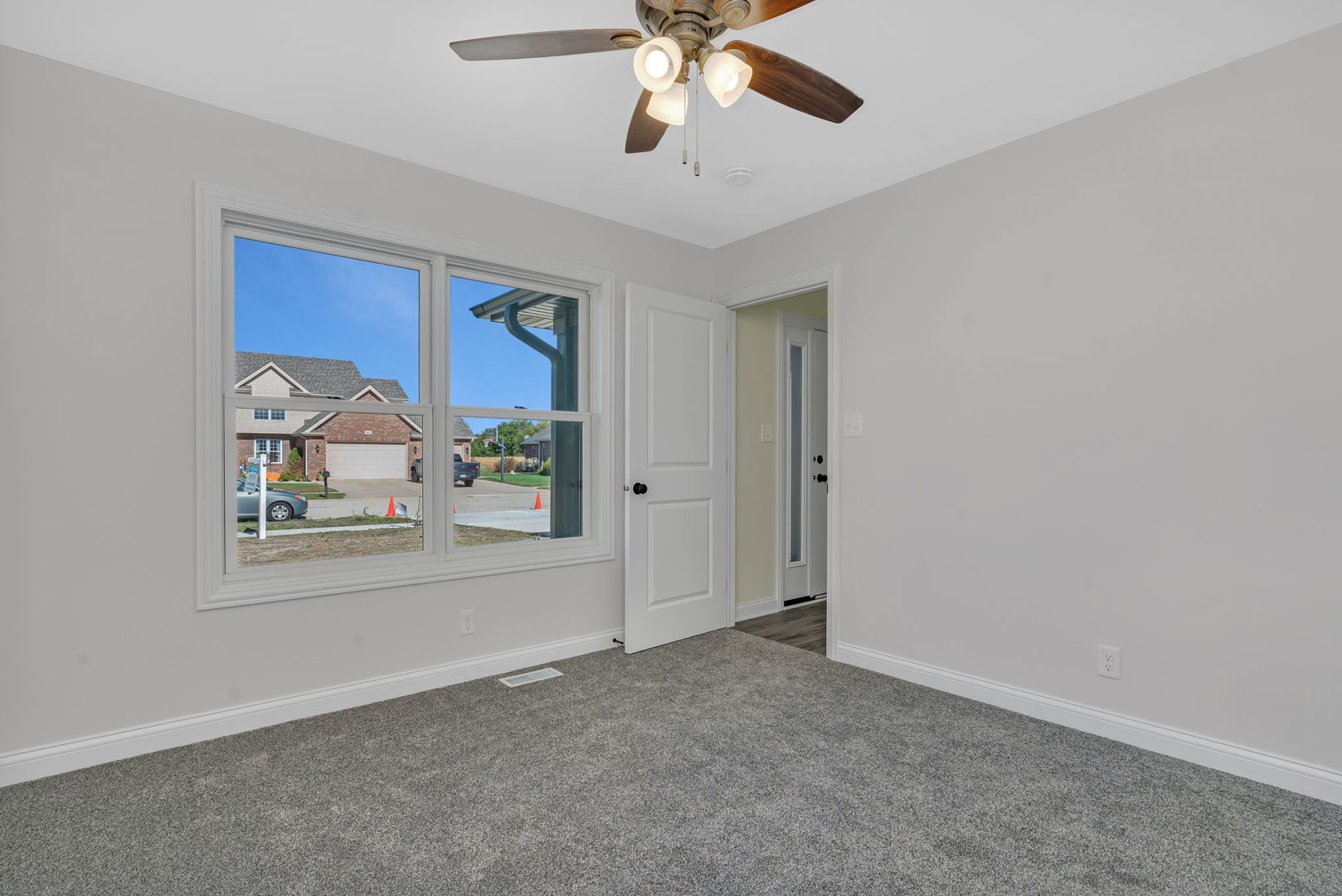 903 Springhill Drive Coal City, IL 60416 - Photo 26 of 37 a view of empty room with window and ceiling fan