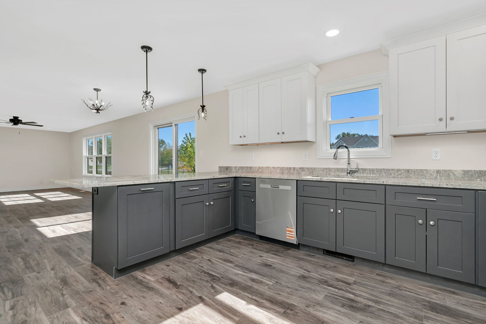 903 Springhill Drive Coal City, IL 60416 - Photo 6 of 37 a kitchen with stainless steel appliances granite countertop a sink a stove and cabinets