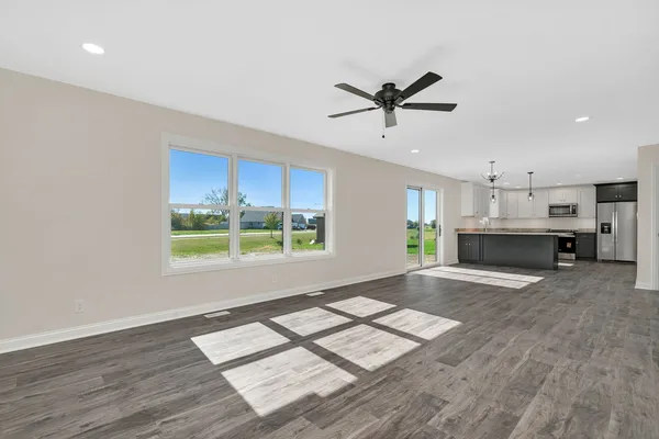 a view of workspace with kitchen island furniture and a window