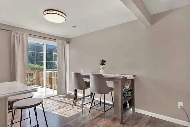 a view of a livingroom with furniture and window