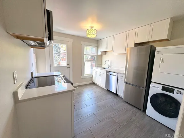 a utility room with storage and utility