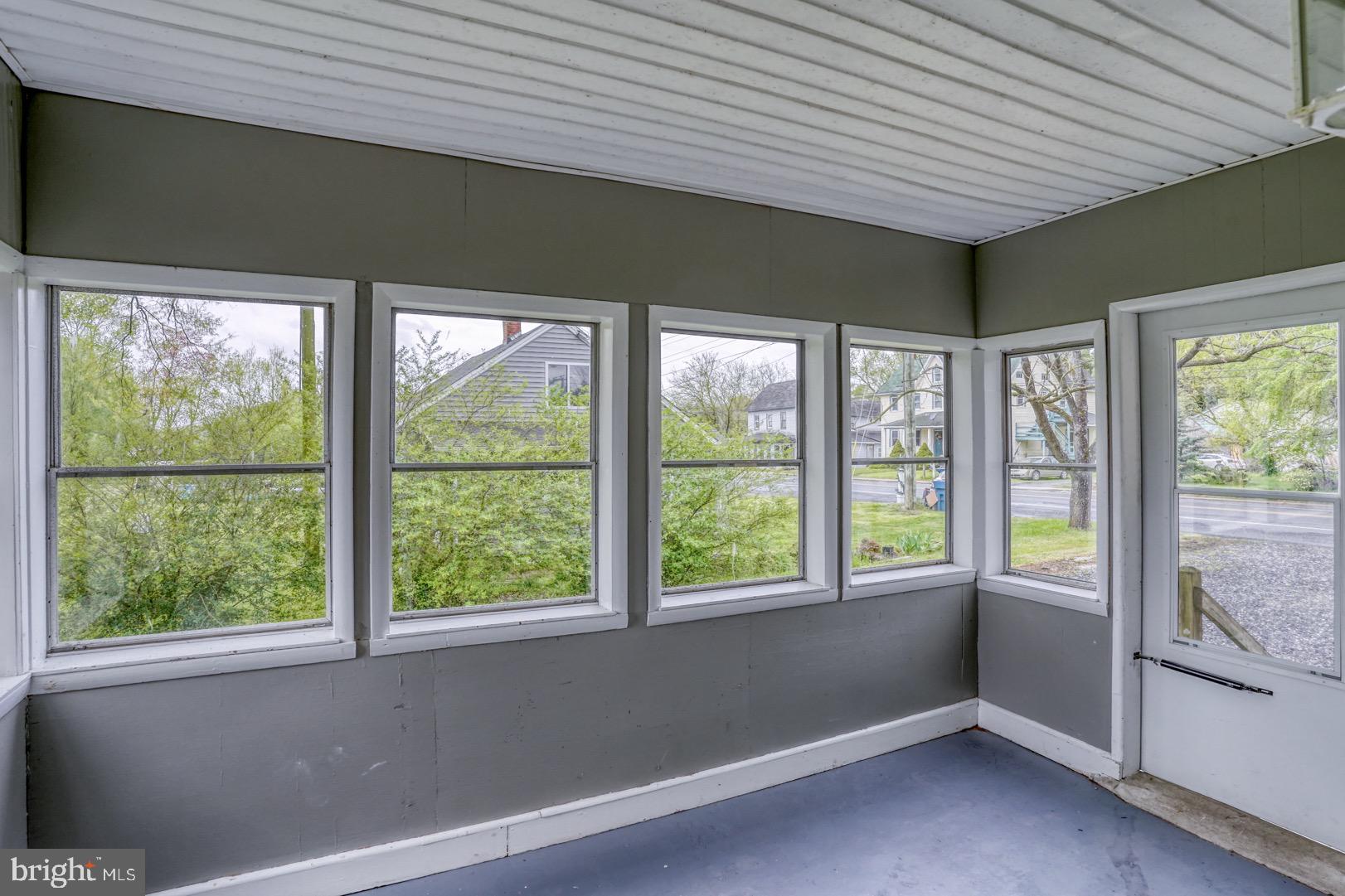 26875 Barclay Road Marydel, MD 21649 - Photo 4 of 38 Porch with tons of windows!
