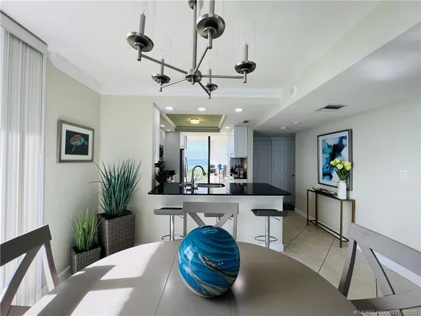 a bedroom with a large bed and a flat screen tv