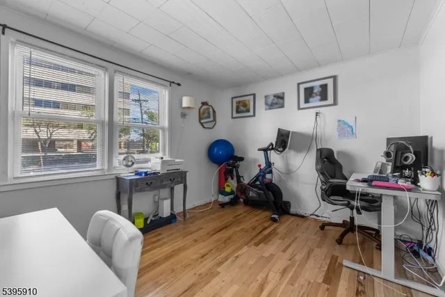 a bedroom with a bed and cabinets