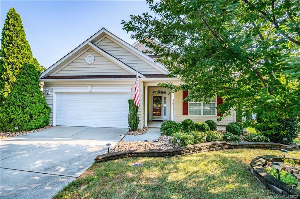 1015 Platinum Drive Fort Mill, SC 29708 - Photo 1 of 2 a front view of a house with a yard and garage