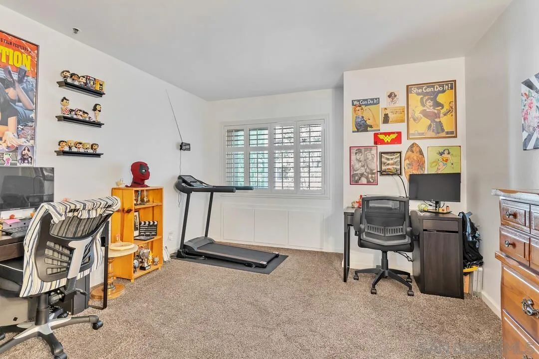 5745 Friars Road, Unit 104 San Diego, CA 92110 - Photo 22 of 38 a view of a workspace with furniture and a window