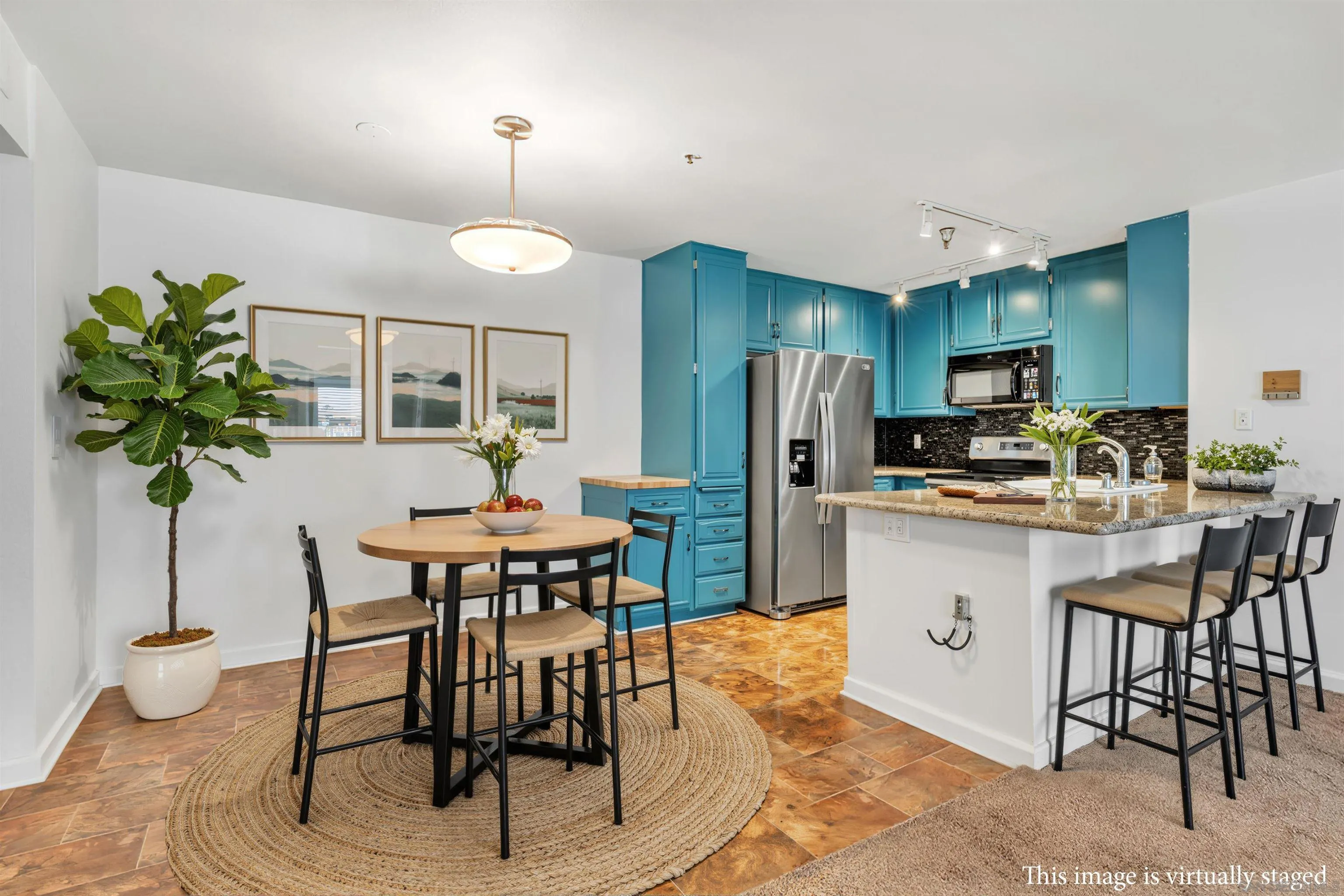 5745 Friars Road, Unit 104 San Diego, CA 92110 - Photo 4 of 38 a view of a dining room with furniture and chandelier