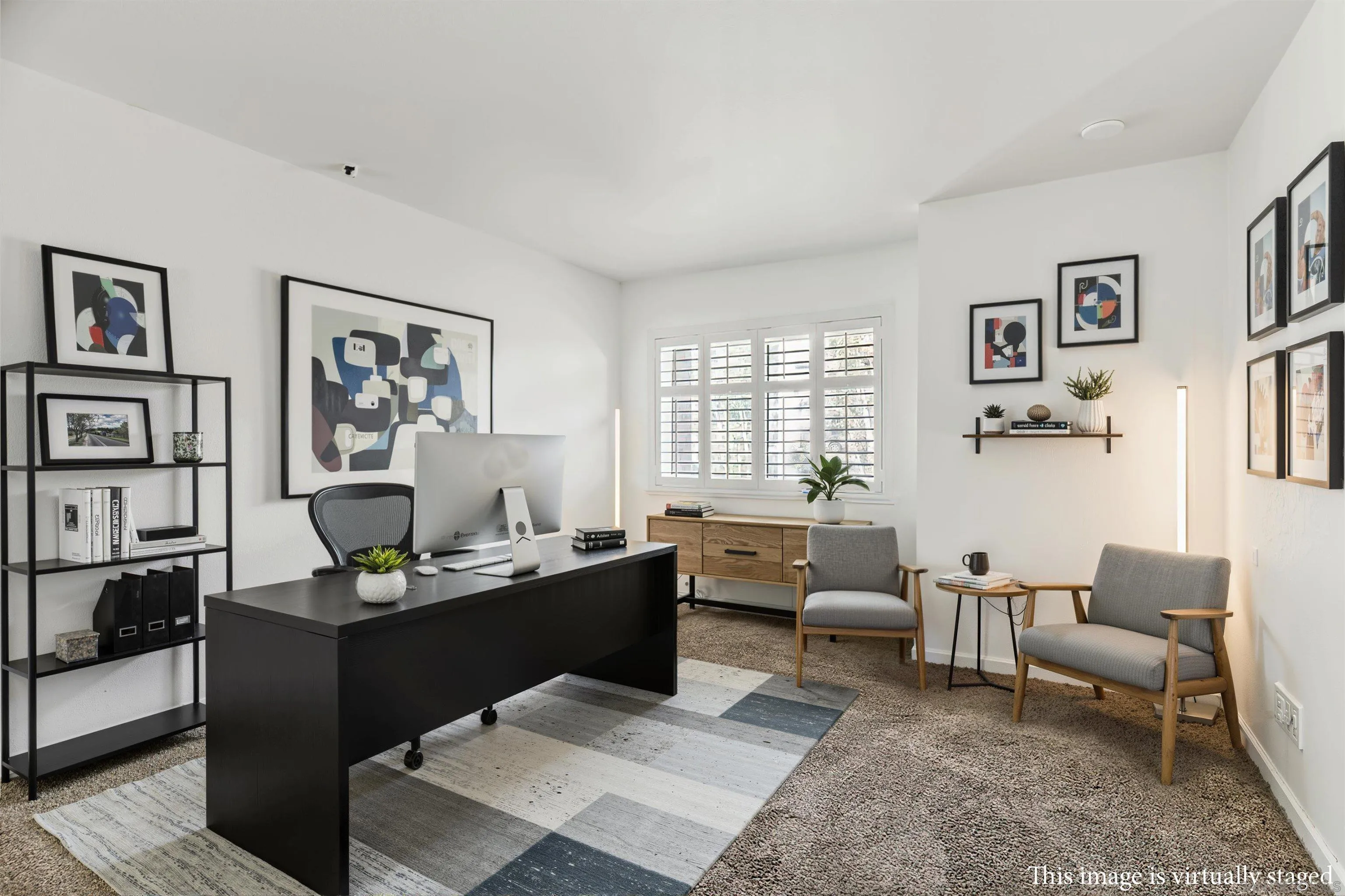 5745 Friars Road, Unit 104 San Diego, CA 92110 - Photo 5 of 37 a living room with furniture and paintings on the wall