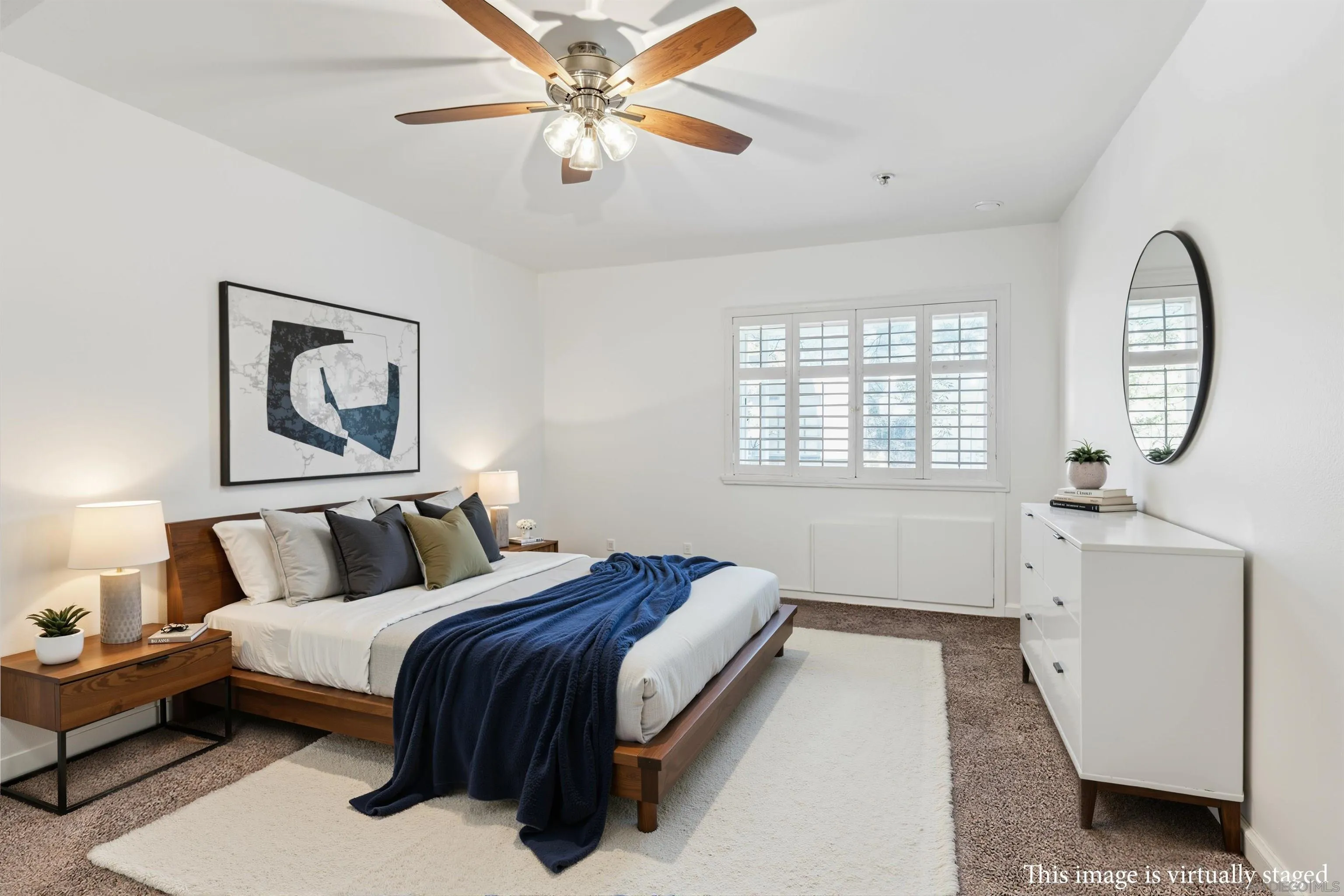 5745 Friars Road, Unit 104 San Diego, CA 92110 - Photo 8 of 38 a bed room with a bed and a chandelier