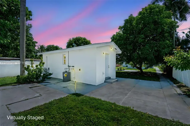 a view of a backyard with green space