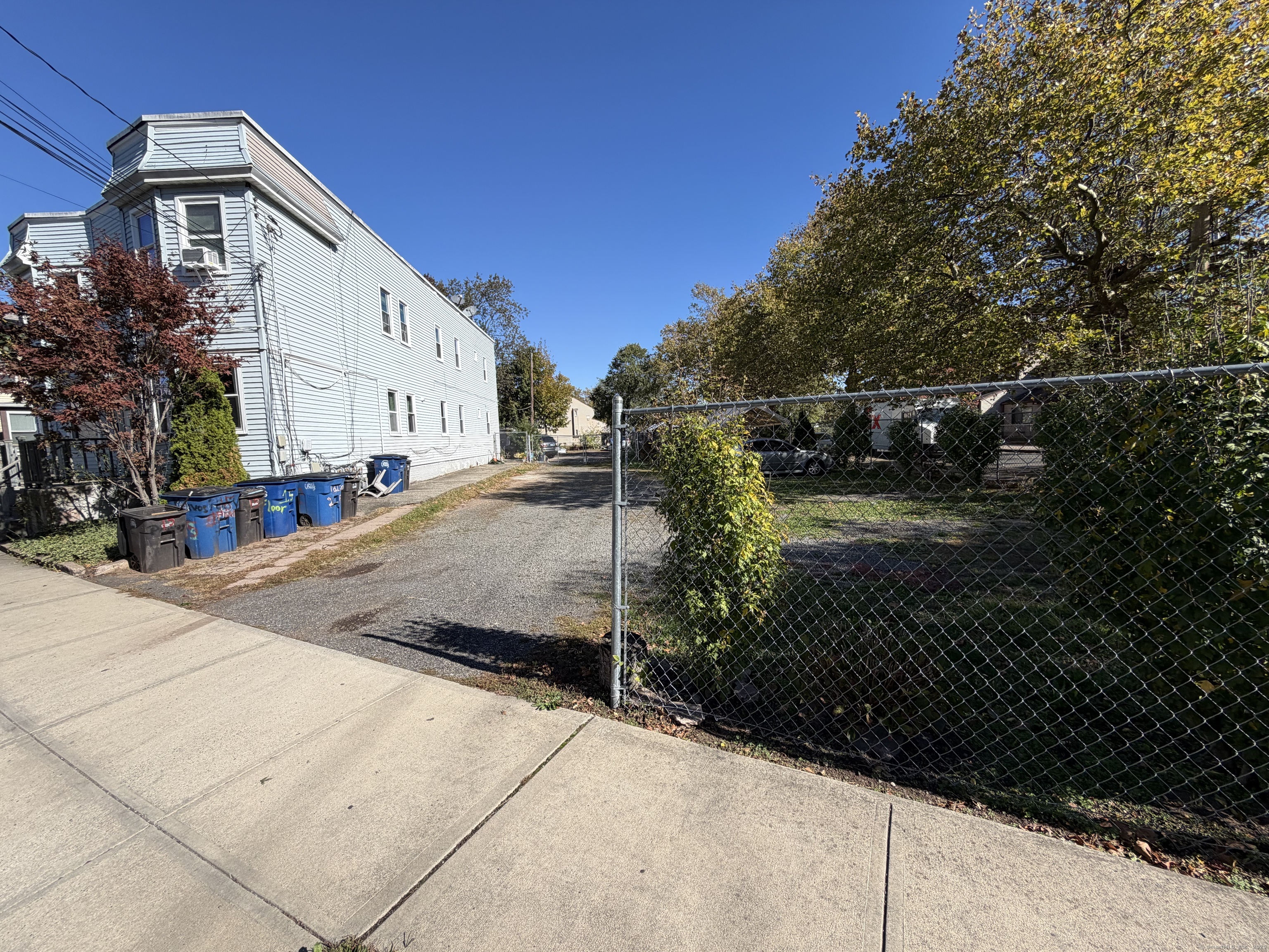 13 Lines Street New Haven, CT 06519 - Photo 2 of 12 a view of a house with backyard and trees