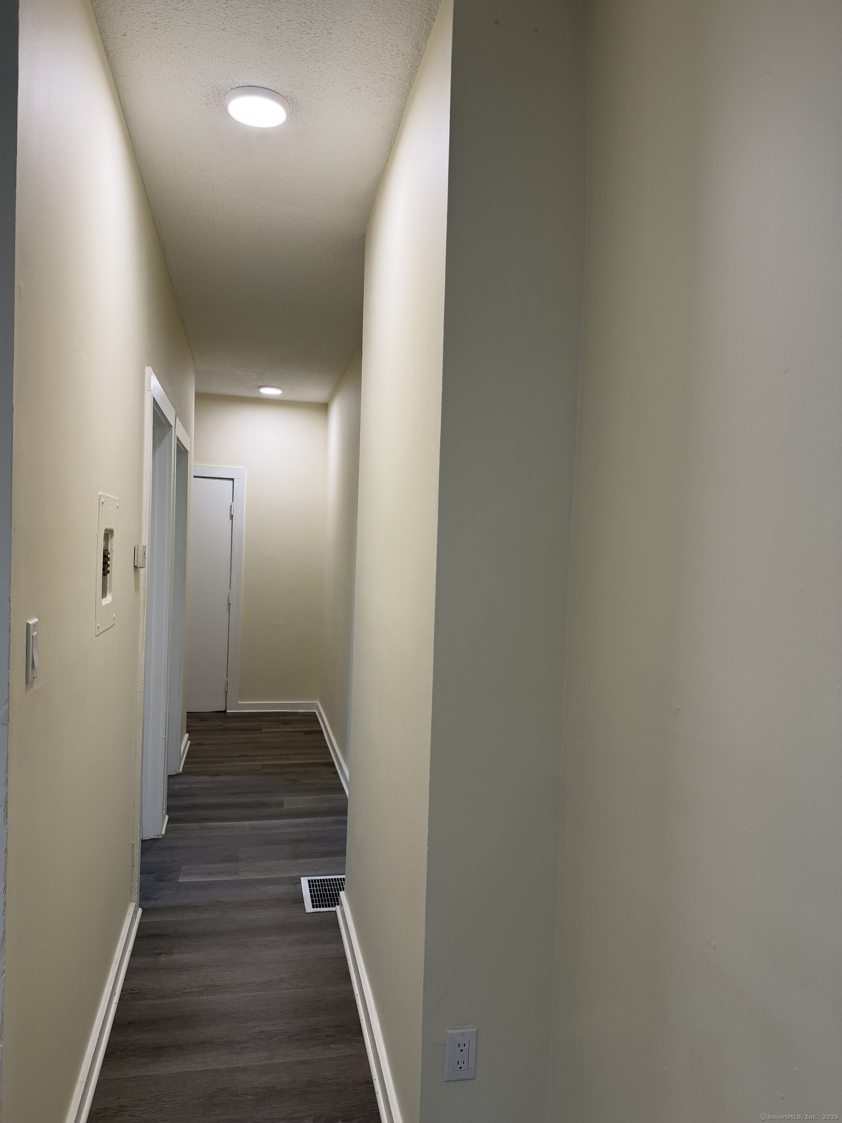 13 Lines Street New Haven, CT 06519 - Photo 7 of 12 a view of a hallway with wooden floor