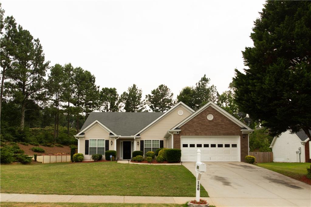 160 Circle Road Dacula, GA 30019 - Photo 1 of 1 a view of house with garden