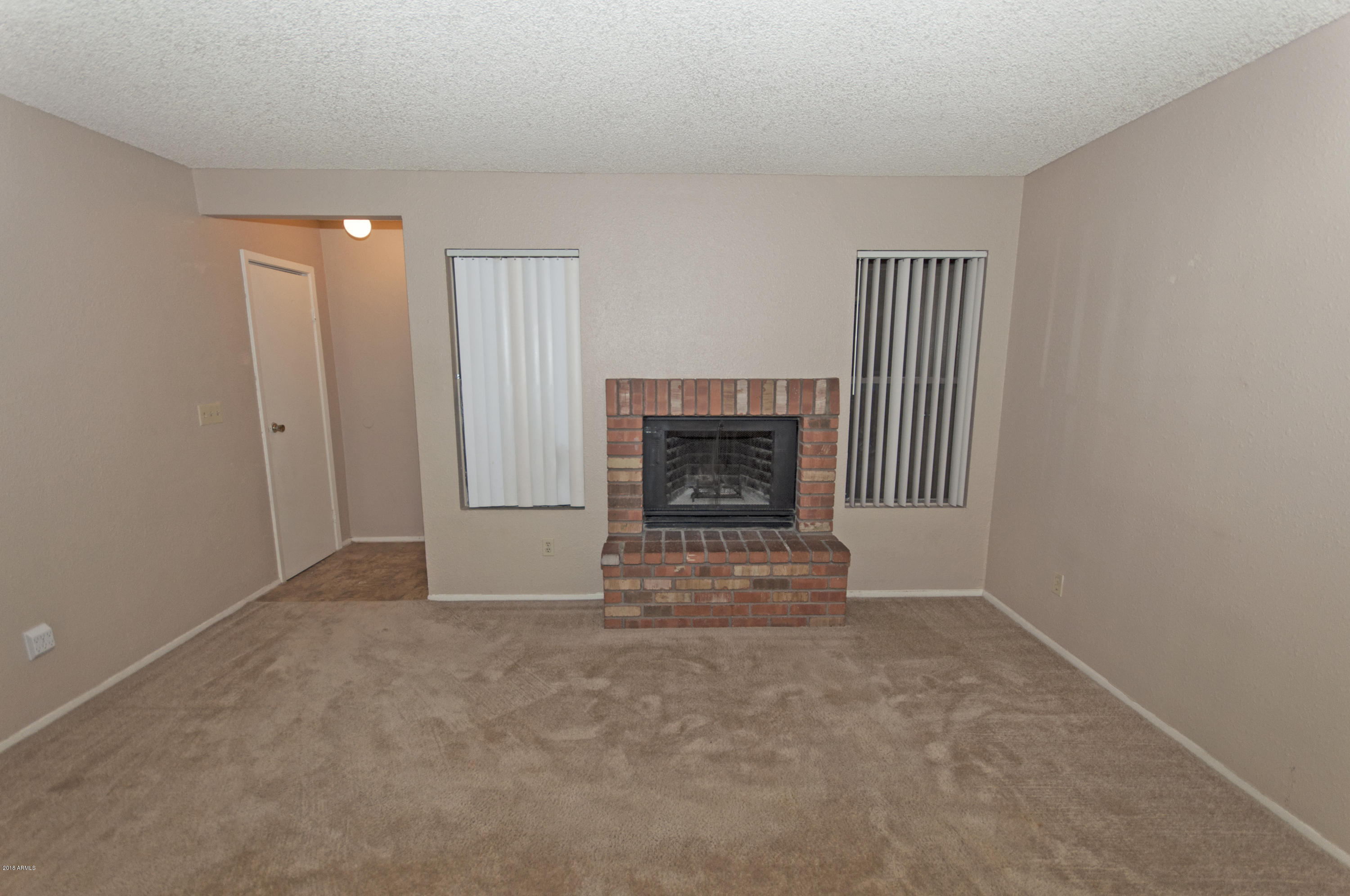 3511 East Baseline Road, Unit 1191 Phoenix, AZ 85042 - Photo 2 of 19 cozy fireplace