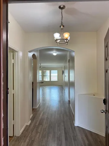 a view of a livingroom with wooden floor