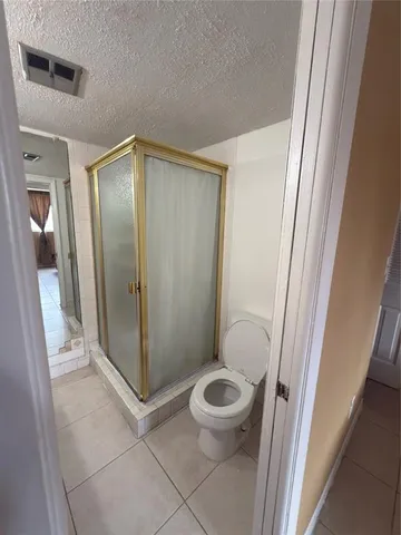 a bathroom with a sink double vanity and a mirror