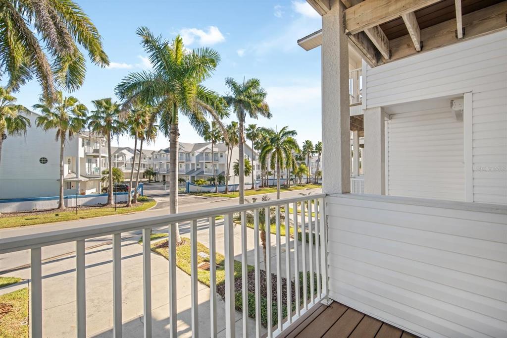 135 Bath Club Circle North Redington Beach, FL 33708 - Photo 14 of 45 a view of outdoor space with swimming pool