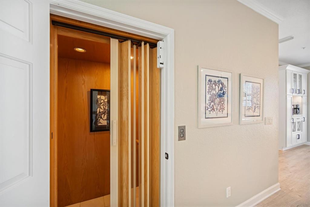 135 Bath Club Circle North Redington Beach, FL 33708 - Photo 16 of 45 a door with a hallway