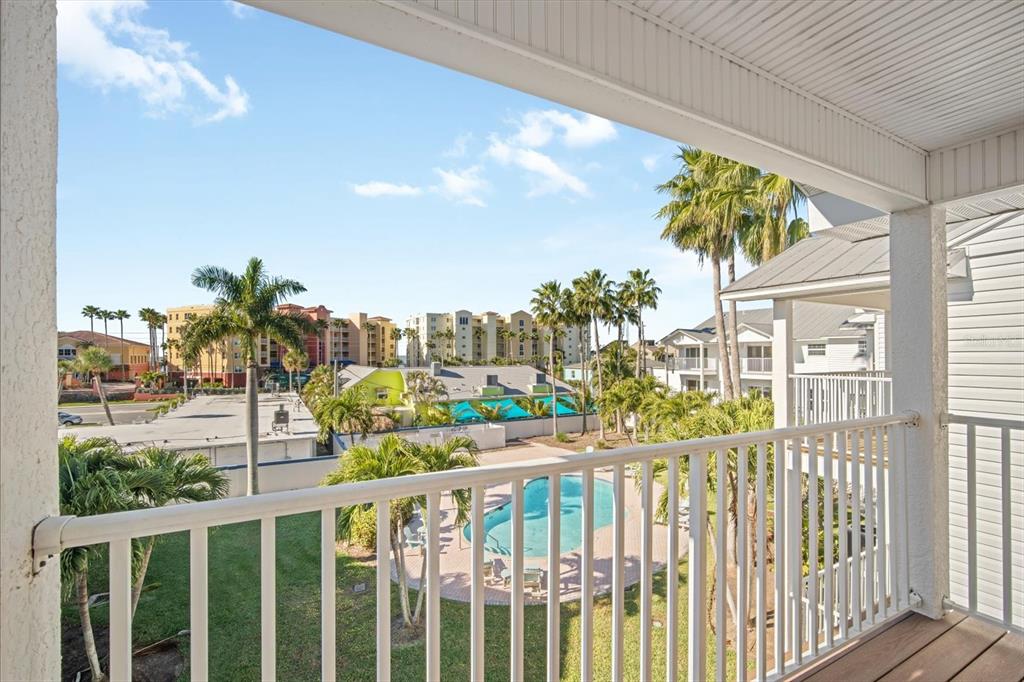 135 Bath Club Circle North Redington Beach, FL 33708 - Photo 21 of 45 a view of a street from a balcony