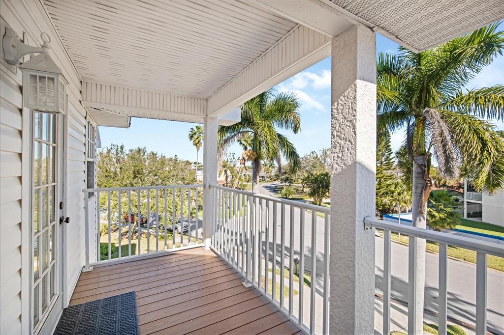135 Bath Club Circle North Redington Beach, FL 33708 - Photo 25 of 45 a view of a porch