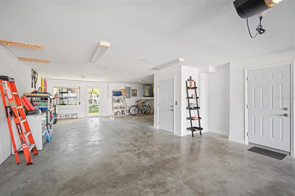135 Bath Club Circle North Redington Beach, FL 33708 - Photo 28 of 45 a view of a room with gym equipment