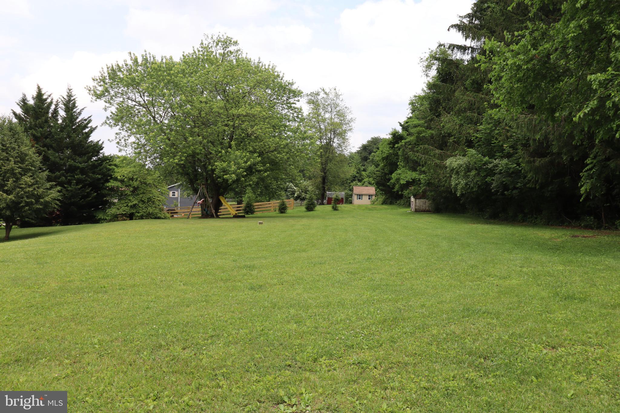 49 Valley View Drive Hanover, PA 17331 - Photo 12 of 64 a view of a green field with trees in the background