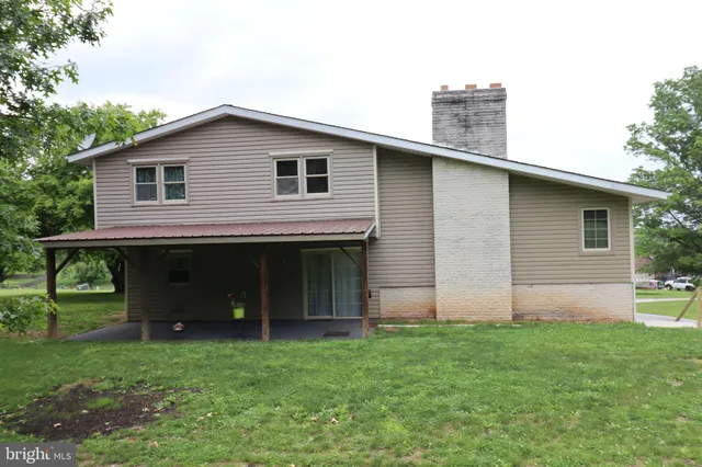 a view of a backyard with a garden