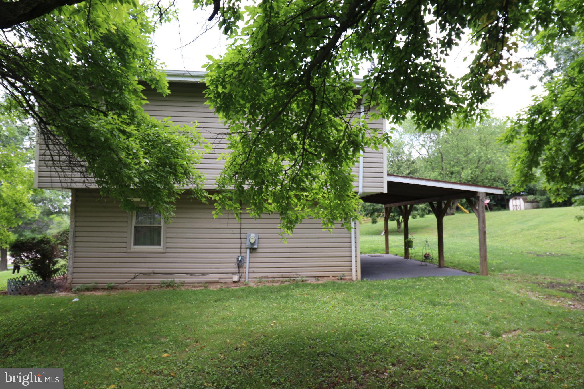 49 Valley View Drive Hanover, PA 17331 - Photo 16 of 64 a view of a backyard with a garden