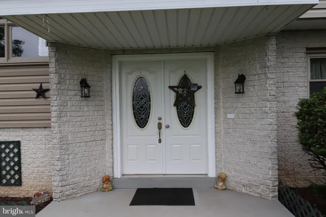 a view of entryway with stairs and wooden floor