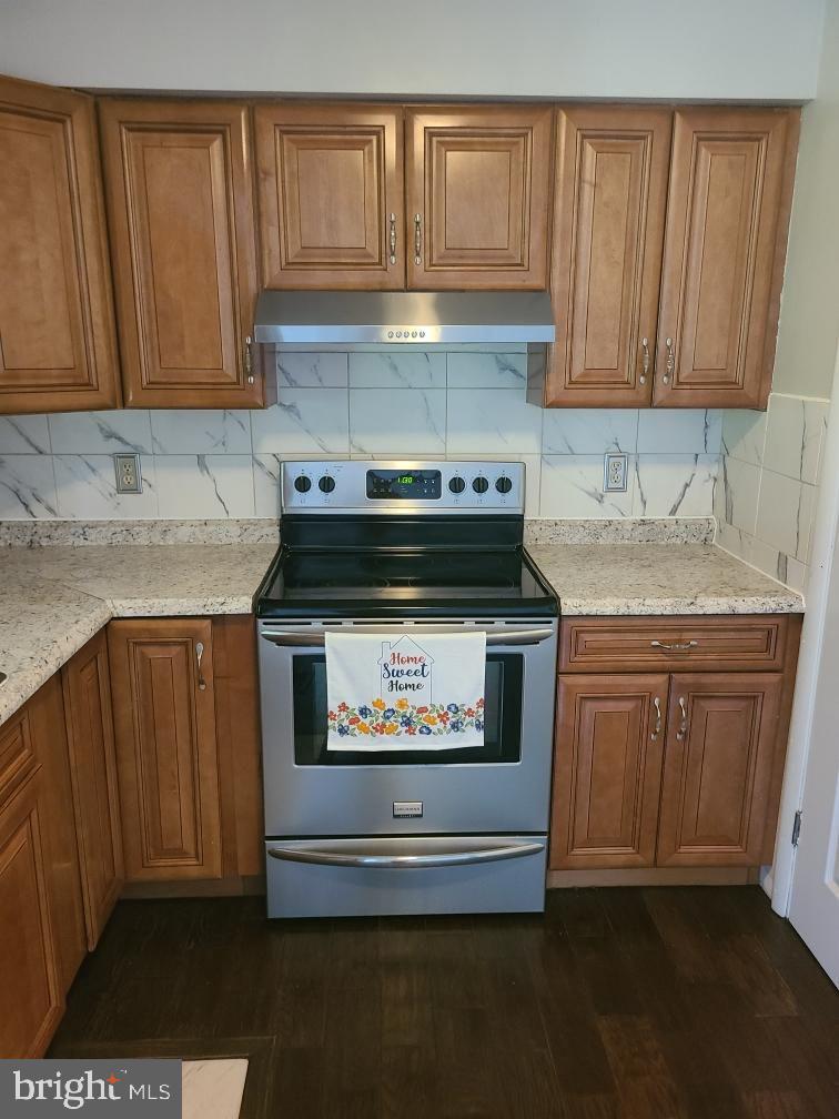 49 Valley View Drive Hanover, PA 17331 - Photo 21 of 64 a kitchen with granite countertop wood cabinets and stainless steel appliances