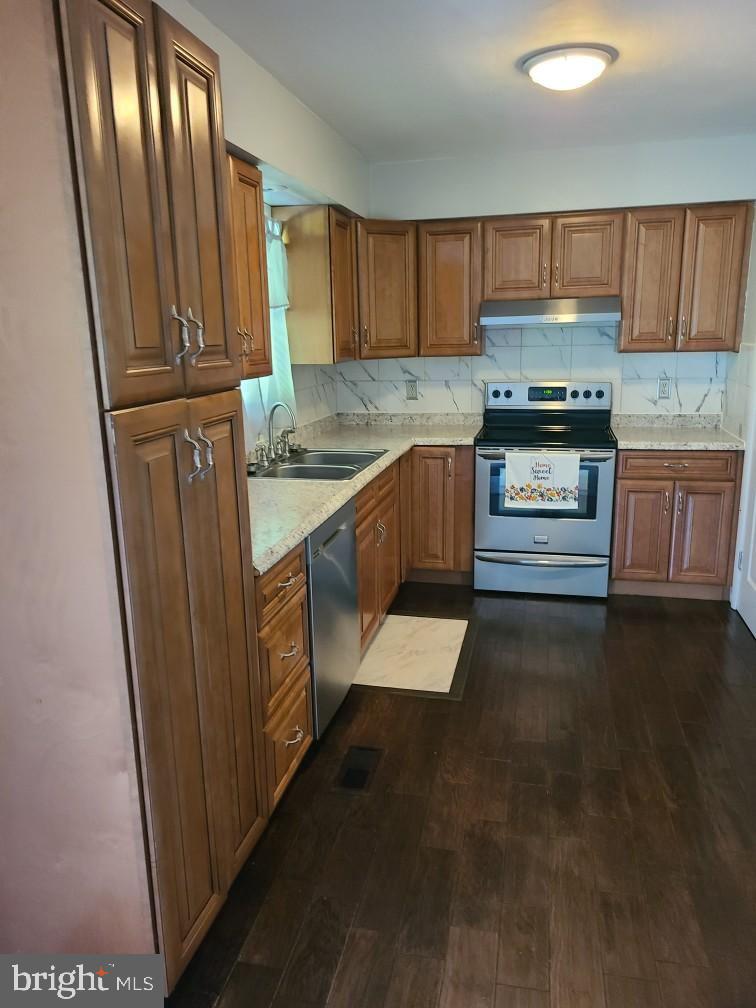 49 Valley View Drive Hanover, PA 17331 - Photo 23 of 64 a kitchen with granite countertop wooden cabinets and stainless steel appliances