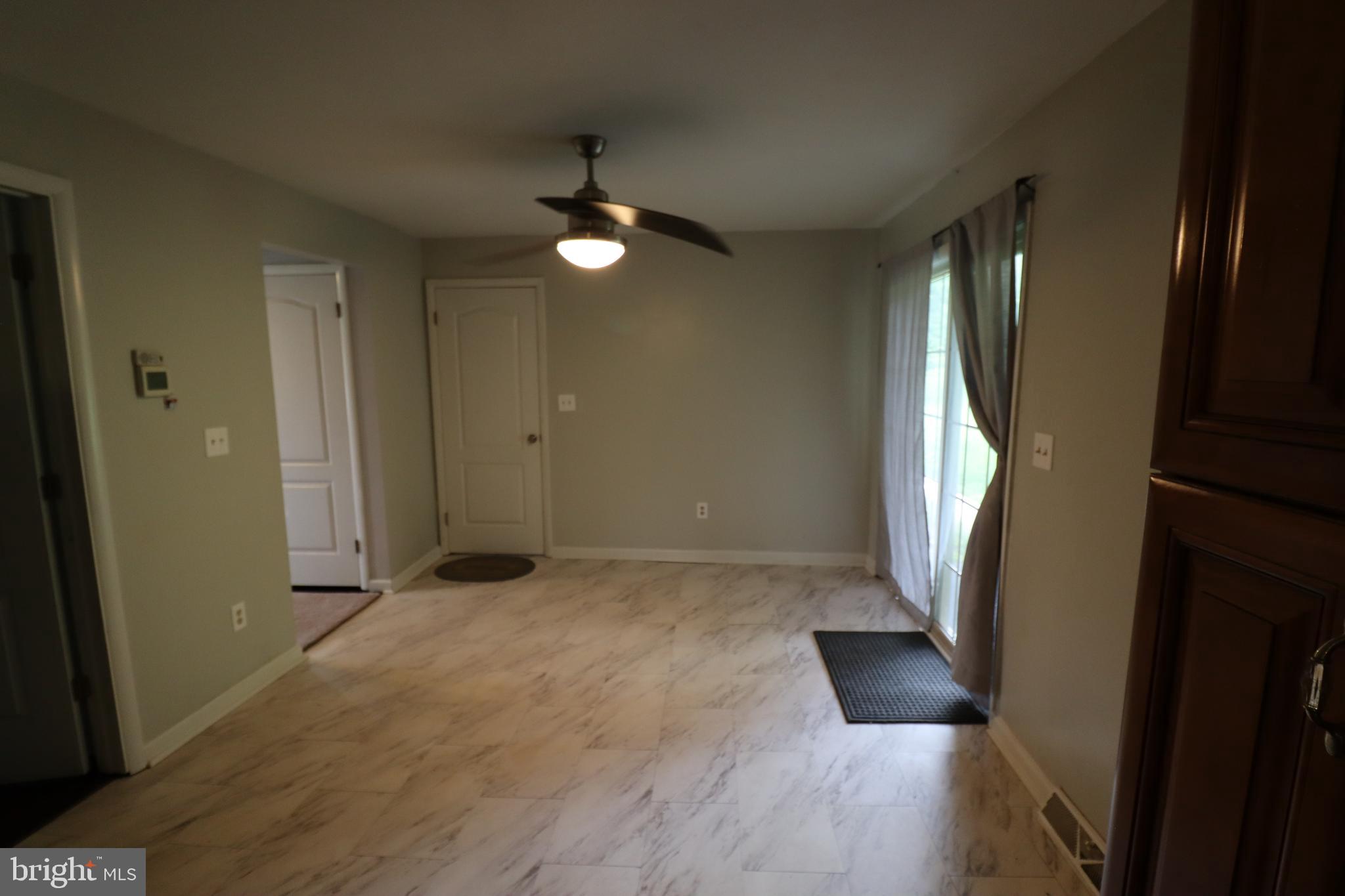 49 Valley View Drive Hanover, PA 17331 - Photo 25 of 64 an empty room with wooden floor and windows