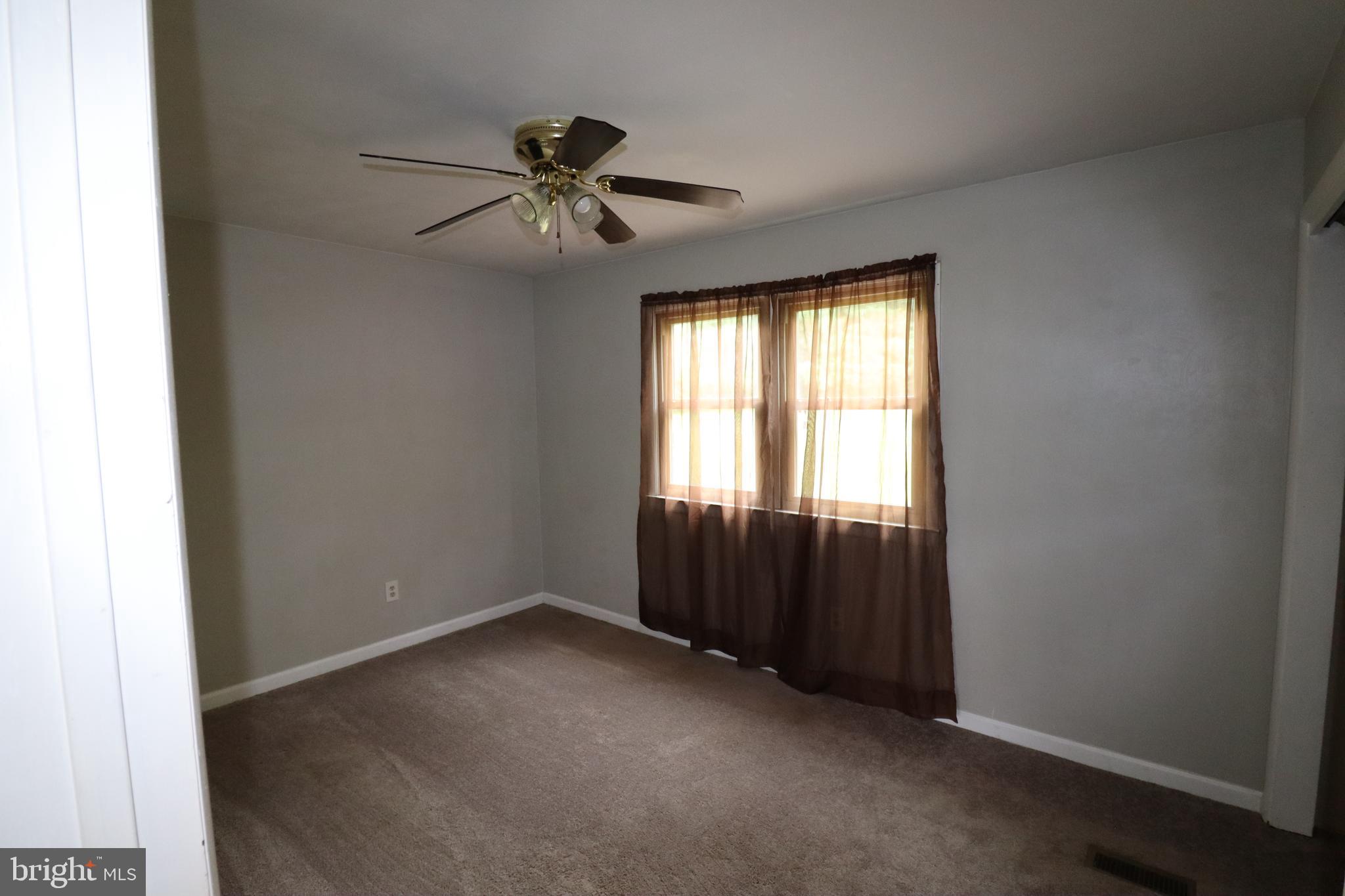 49 Valley View Drive Hanover, PA 17331 - Photo 41 of 64 an empty room with windows and fan