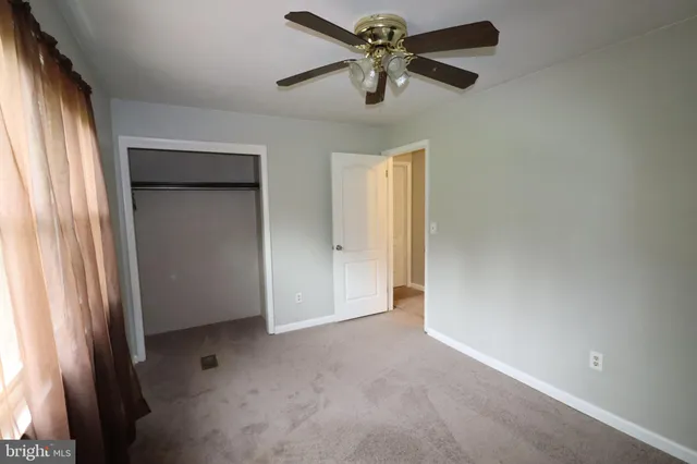 a bathroom with a sink a mirror and a shower