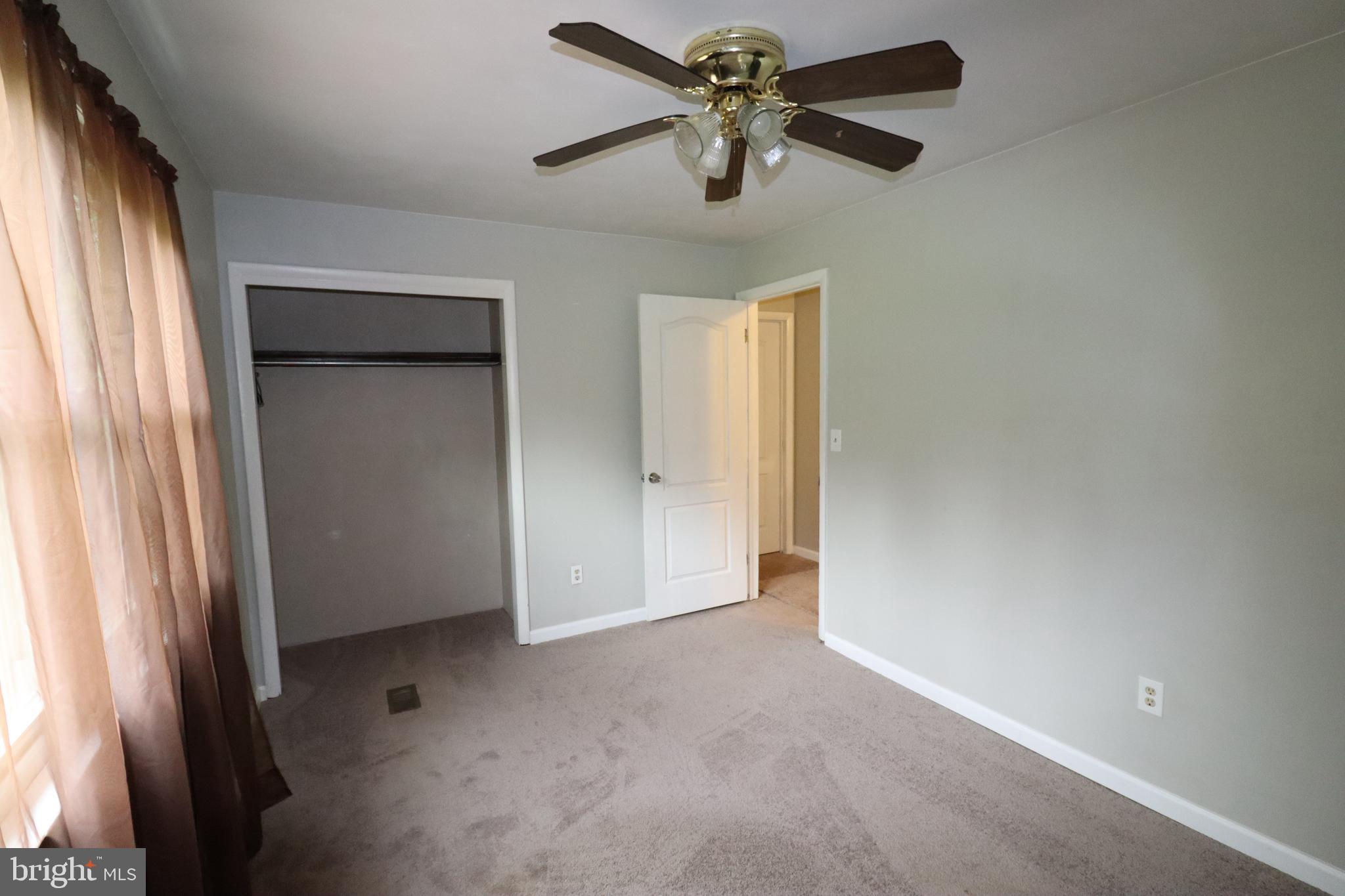 49 Valley View Drive Hanover, PA 17331 - Photo 42 of 64 an empty room with a window and a fan