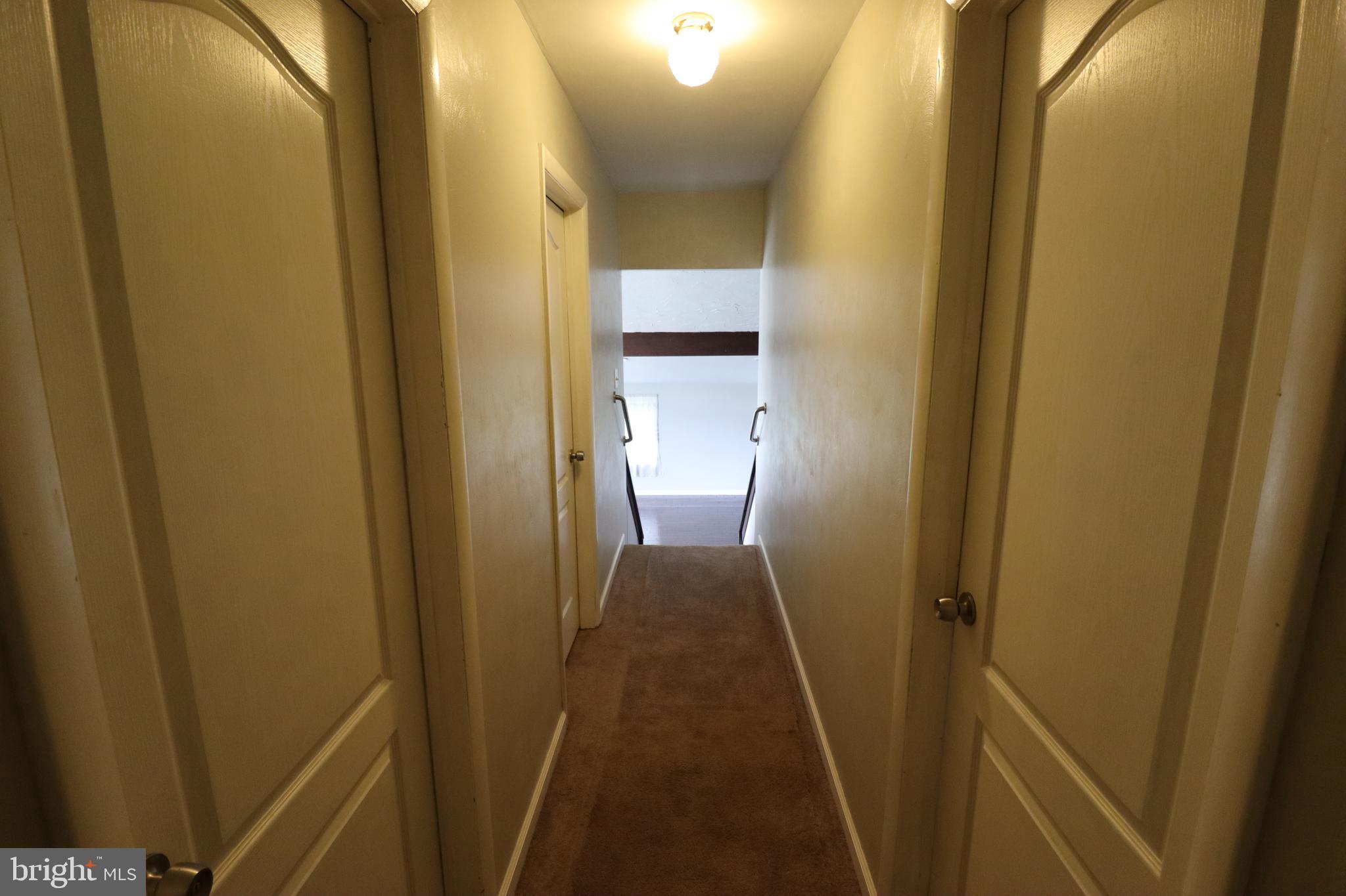 49 Valley View Drive Hanover, PA 17331 - Photo 56 of 64 a view of a hallway with wooden floor