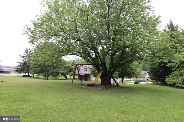 a view of an outdoor space and a yard