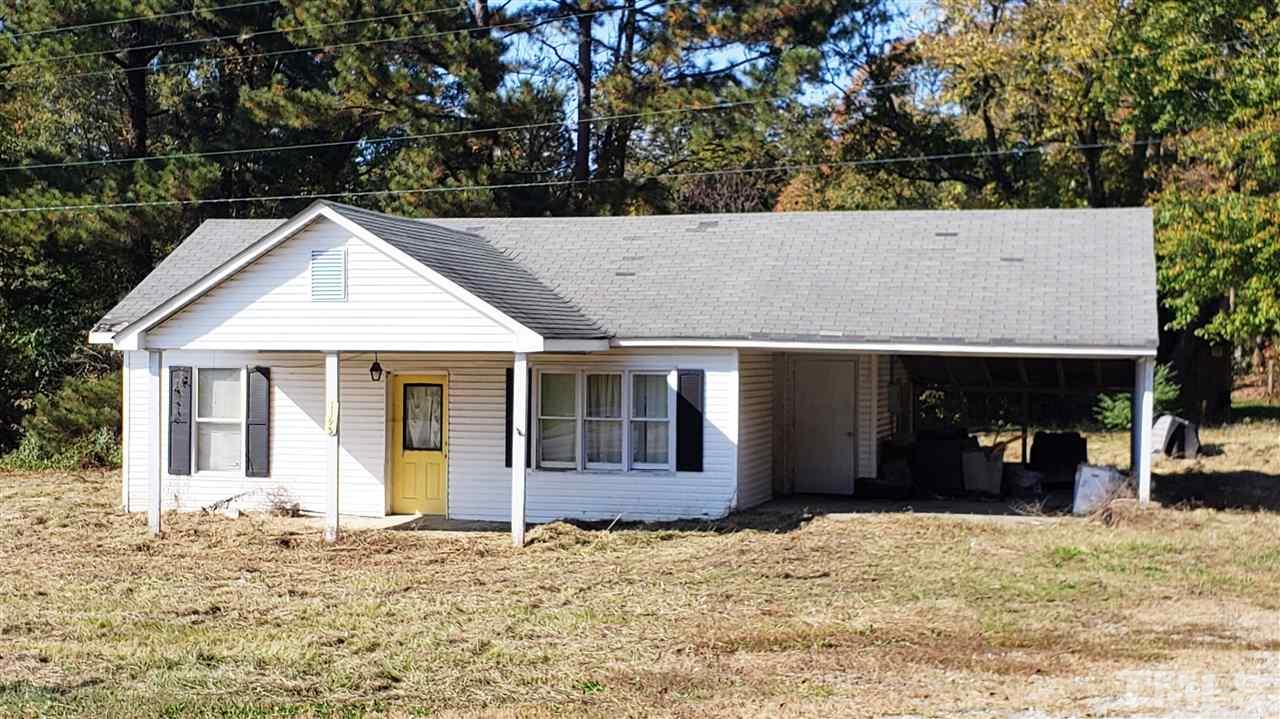 1195 Concord Ceffo Road Roxboro, NC 27574 - Photo 1 of 7 front view of a house with a yard