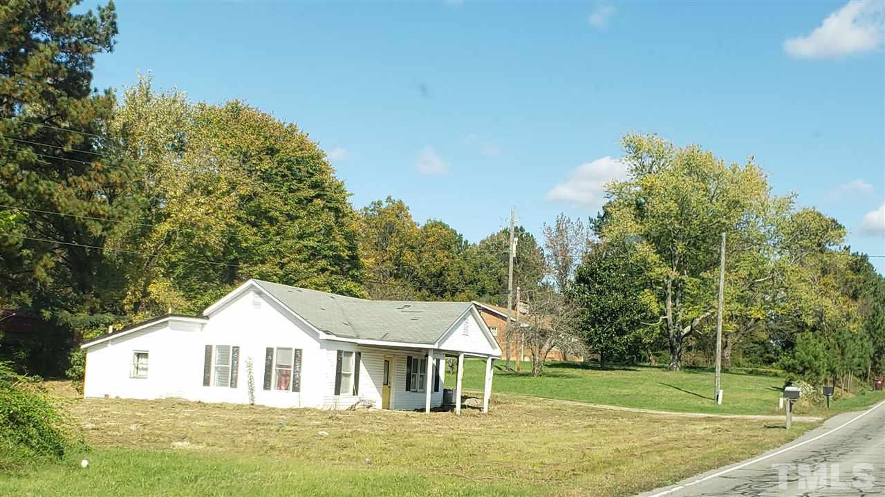 1195 Concord Ceffo Road Roxboro, NC 27574 - Photo 7 of 7 a view of house with garden