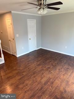 41 Fleming Street Newark, DE 19713 - Photo 3 of 13 an empty room with wooden floor and windows