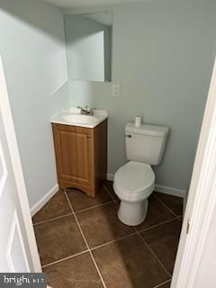 41 Fleming Street Newark, DE 19713 - Photo 7 of 13 a bathroom with a toilet and a sink