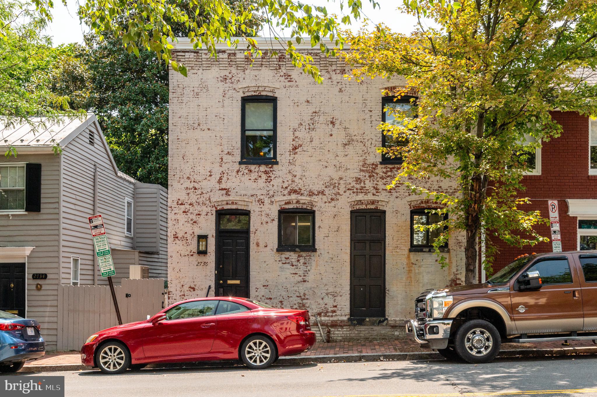 Charming brick facade in a vibrant neighborhood.