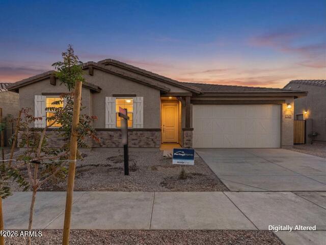 17629 West Madison Street Goodyear, AZ 85338 - Photo 2 of 46 Exterior - Twilight Virtually Staged