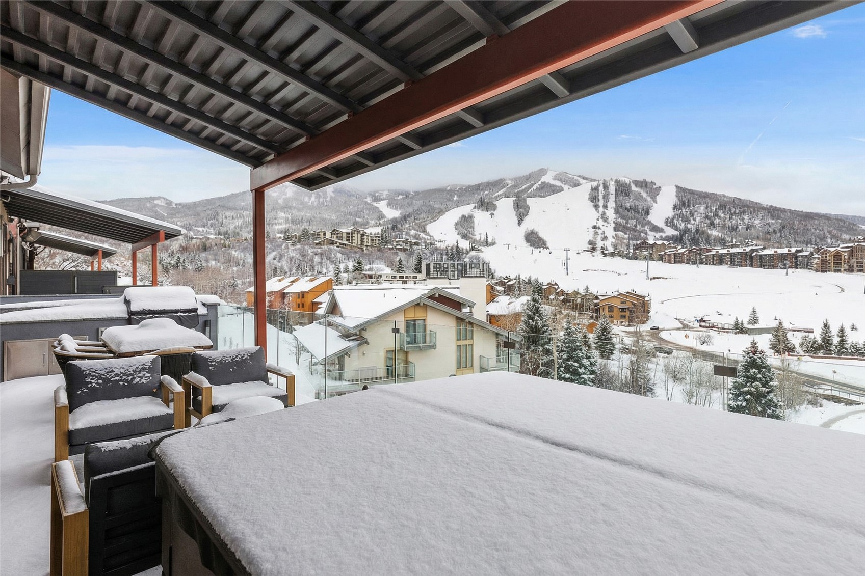 1855 Burgess Creek Road, Unit 4 Steamboat Springs, CO 80487 - Photo 15 of 42 a view of balcony with furniture