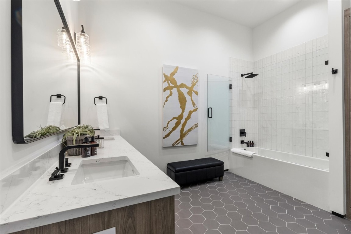 1855 Burgess Creek Road, Unit 4 Steamboat Springs, CO 80487 - Photo 19 of 45 a bathroom with a sink and a bathtub