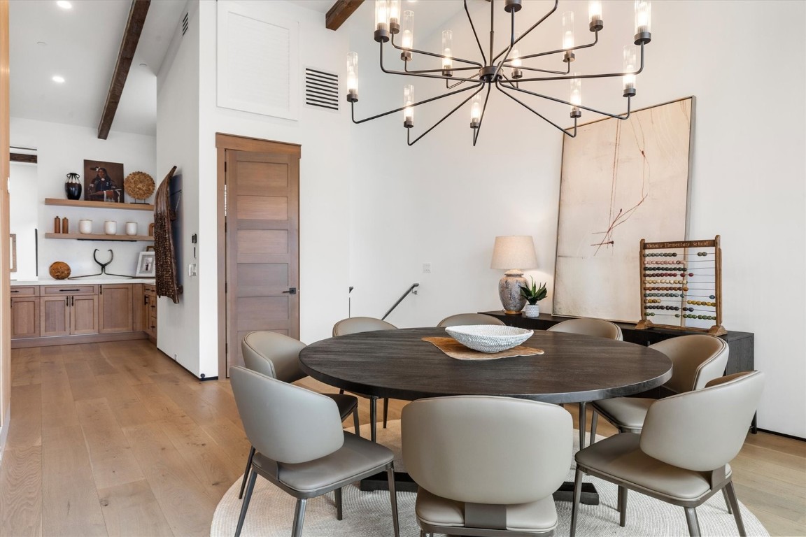1855 Burgess Creek Road, Unit 4 Steamboat Springs, CO 80487 - Photo 23 of 45 a view of a dining room with furniture and wooden floor