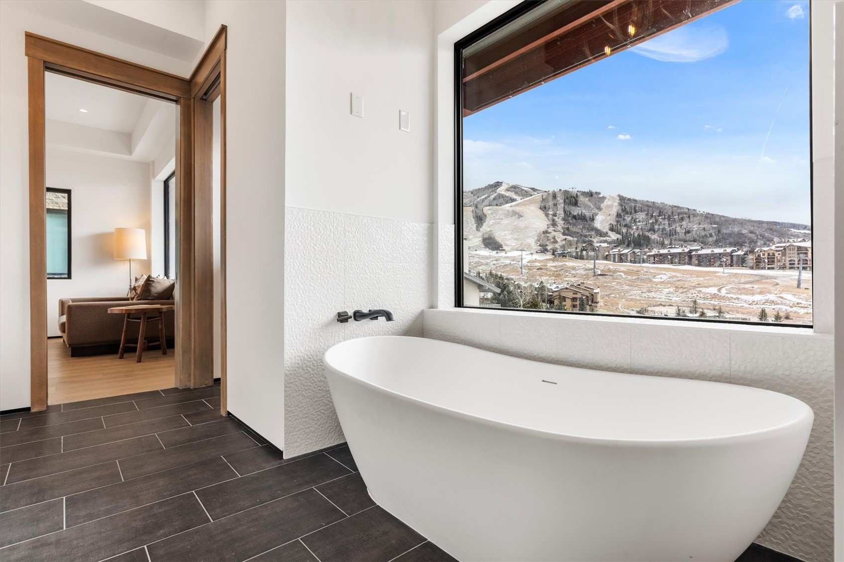 1855 Burgess Creek Road, Unit 4 Steamboat Springs, CO 80487 - Photo 27 of 42 Soak in views of Steamboat Ski Resort all year-round from the comfort of your tub
