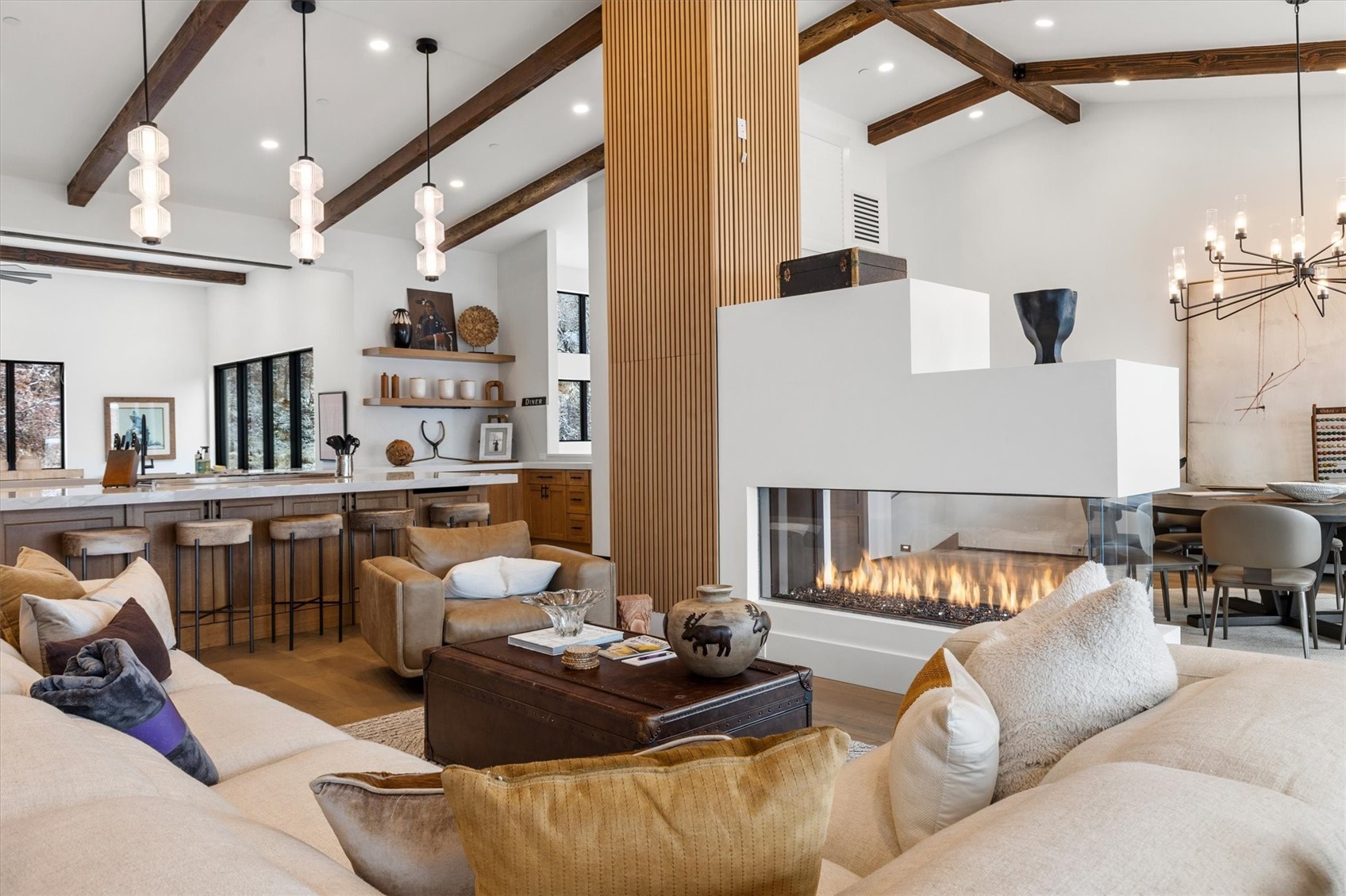 1855 Burgess Creek Road, Unit 4 Steamboat Springs, CO 80487 - Photo 3 of 42 Open layout with a 3-sided gas fireplace