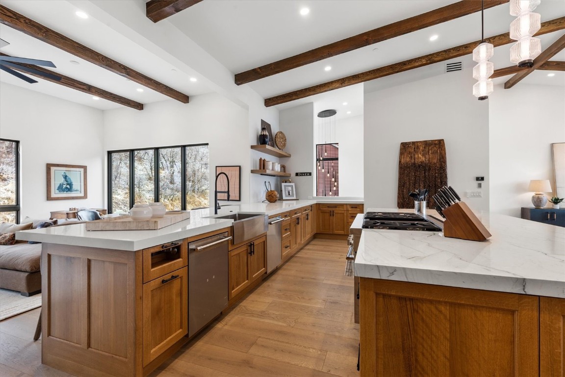 1855 Burgess Creek Road, Unit 4 Steamboat Springs, CO 80487 - Photo 31 of 45 a kitchen with a stove and a sink