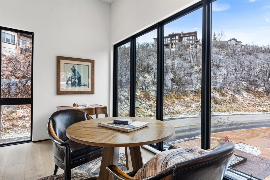 1855 Burgess Creek Road, Unit 4 Steamboat Springs, CO 80487 - Photo 33 of 45 a view of a dining room with furniture and window